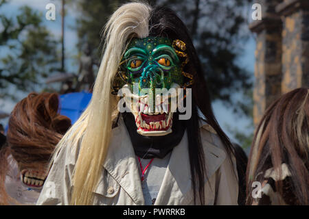 Terrifying traditional mexican carnival tastoan mask in the magical town of Tonala, Jalisco, Mexico Stock Photo