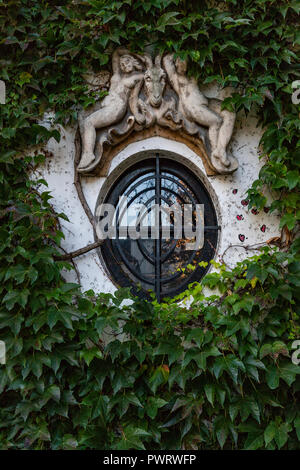 Ornate Paris Window - Thousands of doors and gates adorn buildings in Paris.  Some of the best are on government offices, cathedrals and churches, as  Stock Photo