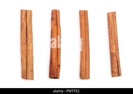 Cinnamon sticks isolated on white background. Top view. Stock Photo