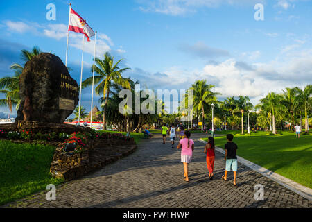 Local people strolling on the waterfront parc of Papeete, Tahiti, French Polynesia Stock Photo