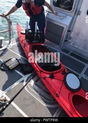 Coast Guard and partner agency crews are searching for a possible person in the water south of Stratford, Connecticut, Monday. Anyone has any information about the owner of the kayak and their possible location please contact Coast Guard Sector Long Island Sound Command Center at: (203) 468-4421. Stock Photo