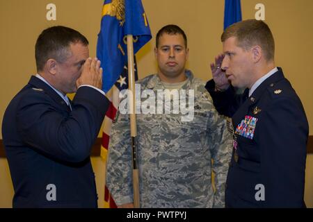 Lt. Col. Brett DeAngelis takes command of the 1st Special Operations Air Operations Squadron from Lt. Col. Aaron Ffrench during a Change of Command ceremony at Hurlburt Field, Fla., June 20, 2017. Stock Photo