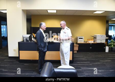 Pittsburgh PA (June 20, 2018) Vice Admiral Forrest Faison Surgeon General and Chief, Bureau of Medicine and Surgery meets the Owner of the Pittsburgh Steelers Art Rooney II after touring Sports Medicine Center and training. Navy Week focus a variety of outreach assets, equipment and personal on a single city for a week-long series of engagements with key influencers and organizations representing all sectors of the market. During a Navy Week, 75-100 outreach events are coordinated with corporate, civic, government, education, media, veterans, and community service and diversity organization in Stock Photo
