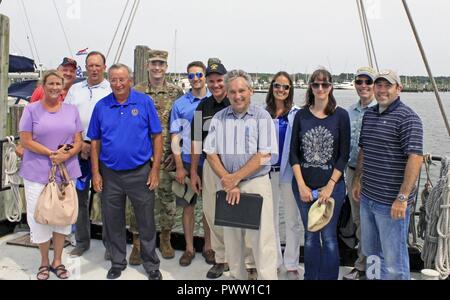 Col. Ed Chamberlayne, U.S. Army Corps of Engineers, Baltimore District commander, and other Baltimore District team members pose for a group shot during a visit to Smith Island with project partners from Maryland Department of Natural Resources and Somerset County to discuss a navigation improvement project at Rhodes Point, Maryland, June 22, 2017. Stock Photo