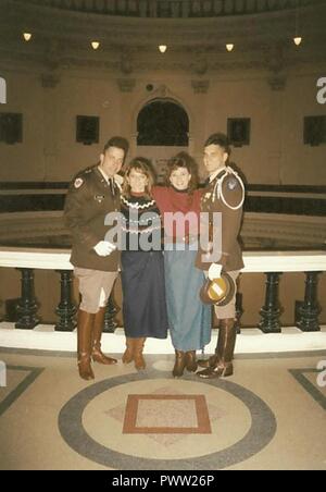 Texas A&M University cadets Douglas Thies, far right, and David Vaclavik, far left stand for a picture in their uniforms with their future wives after a Texas A&M football game in Austin, Texas, circa 1992. As best friends, the two would become commissioned Air Force officers and eventually command groups at Shaw Air Force Base, S.C., at the same time. Stock Photo