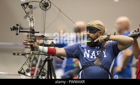 Navy veteran Petty Officer 2nd Class Adrian Mohammed competes as a