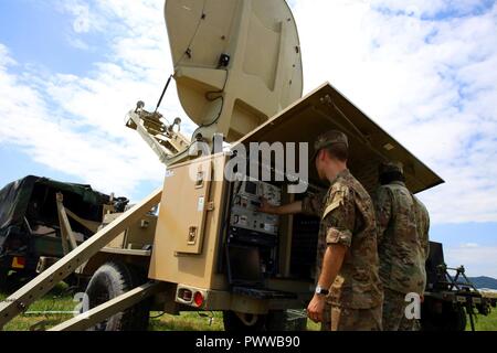 U.S. Army Sgt. Harrison Nichols, a Command Post Node team chief ...