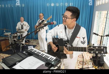 NHA TRANG, Vietnam (July 6, 2017) The U.S. 7th Fleet Band, Orient Express, performs at Khanh Hoa Center for Social Protection during Naval Engagement Activity (NEA) Vietnam 2017 July 6. The engagement provides an opportunity for Sailors from the U.S. and Vietnam People's Navy to interact and share knowledge to enhance mutual capabilities and strengthen solid partnerships with the local community. ( Stock Photo