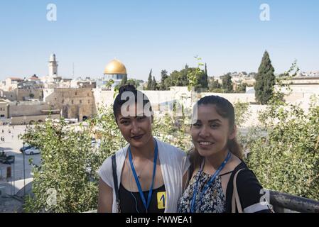 JERUSALEM (July 3, 2017) Boatswain's Mate 3rd Class Julie Roca and Boatswain's Mate 3rd Class Leslie Tomasrodriguez, assigned to the aircraft carrier USS George H.W. Bush (CVN 77), visit the Wailing Wall and the Dome of the Rock in Old City Jerusalem. The ship is in Haifa, Israel for a scheduled port visit to enhance U.S.-Israel relations. ( Stock Photo