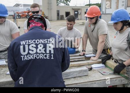 Soldiers with the 1049th Firefighting Detachment (FFTD) install the ...