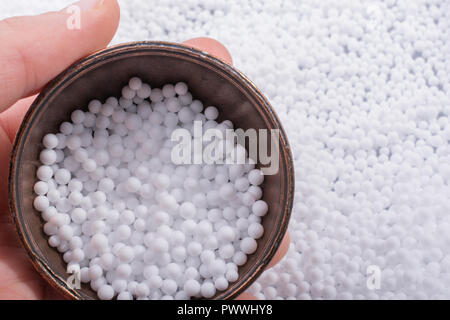 White little polystyrene foam balls as background Stock Photo