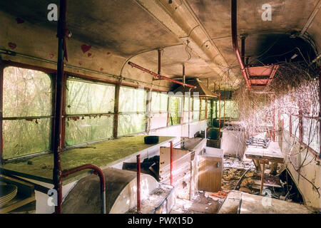 Interior view of a kitchen in an abandoned train in Italy. Stock Photo