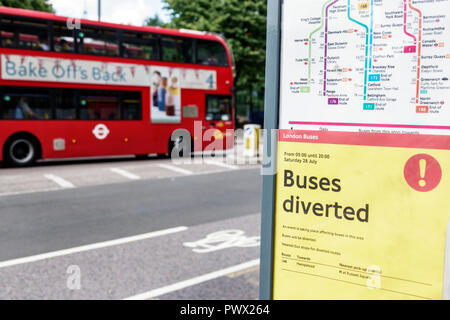 London England,UK,Lambeth South Bank,bus stop,commuter notice,diverted routes,map,red double-decker bus,UK GB English Europe,UK180821009 Stock Photo