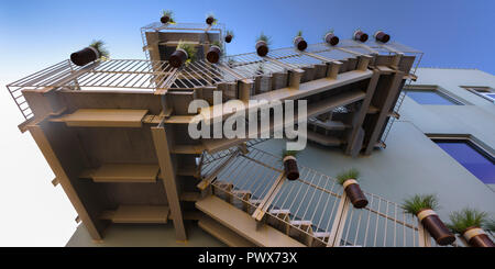 Stairs with potted plants against a blue sky Stock Photo