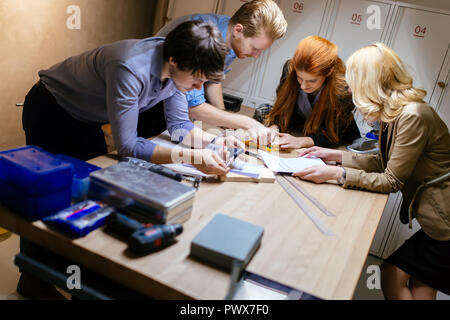 Business people collaborating in office and working on project together Stock Photo