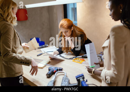 Business people collaborating in office and working on project together Stock Photo