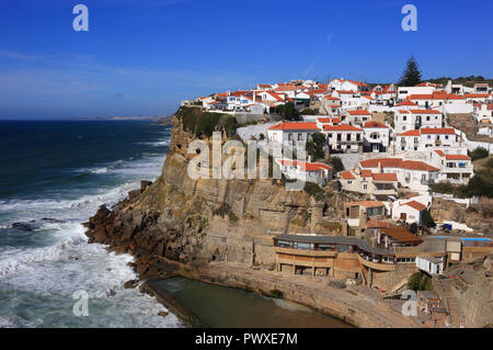 Portugal, Azenhas do Mar, Colares, Sintra near Lisbon. Village built on a cliff-top overlooking the Atlantic Ocean and beach below.