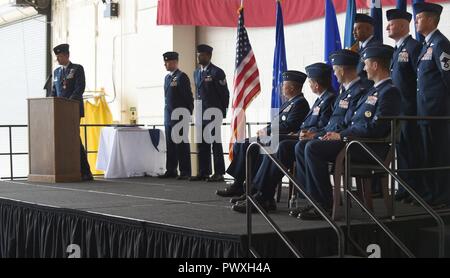 U.S. Air Force Col. Stephen Hodge, 317th Airlift Group commander, speaks to Dyess Airmen, family members and civic leaders at Dyess Air Force Base, Texas, July 6, 2017. Hodge was awarded the Legion of Merit for his contributions and accomplishments while commanding the 317th AG and then relinquished command to Col. David Owens. Stock Photo