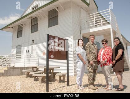 (From left) Danya Cheek, medical support assistant, Addiction Medicine Intensive Outpatient Program (AMIOP), Maj. R. Joel Bush, addiction medicine physician, Gisela Carter, clinical chief, and Soledad Apodaca, psychology technician, stand in front of the AMIOP, which opened its doors to service members at Fort Bliss, July 5. Stock Photo