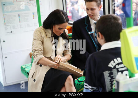 Duchess of Sussex talks to students from Albert Park Primary School, Port Melbourne Primary School and Elwood Secondary College while riding on a tram in Melbourne, on the third day of the royal couple's visit to Australia. Stock Photo