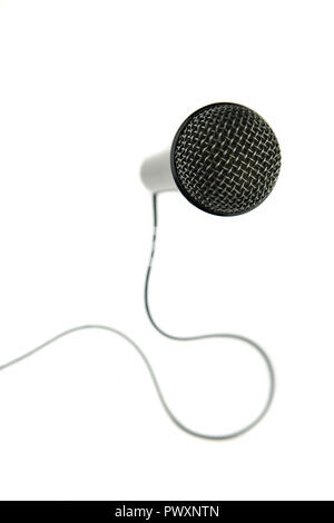 Isolated microphone with cable. The studio musical microphone isolated ...
