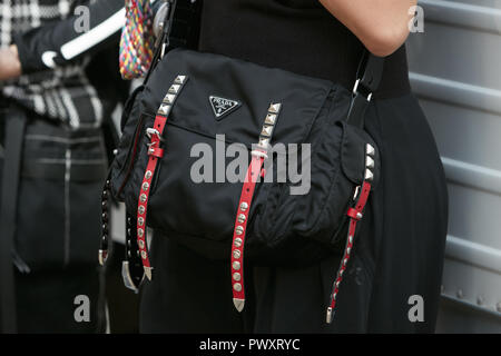 MILAN - SEPTEMBER 21: Woman with Prada velvet bag in green, blue and yellow  colors before Prada fashion show, Milan Fashion Week street style on Septe  Stock Photo - Alamy