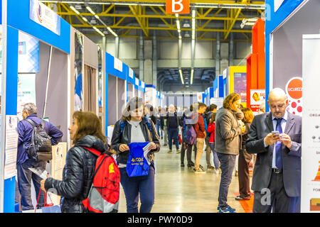 Bologna, Italy.  17th October, 2018. visitors visit the fair.  AMBIENTE LAVORO is the first Italian fair dedicated to safety and health at work. GoneWithTheWind/Alamy Live News Stock Photo