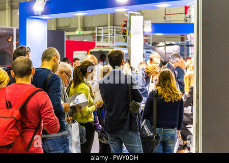 Bologna, Italy.  17th October, 2018. visitors visit the fair.  AMBIENTE LAVORO is the first Italian fair dedicated to safety and health at work. GoneWithTheWind/Alamy Live News Stock Photo