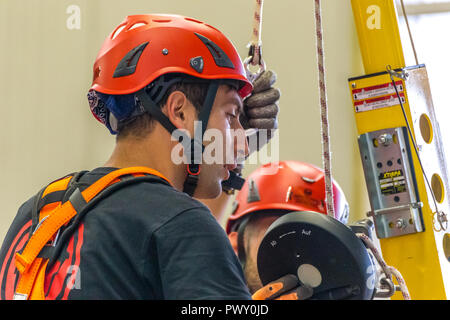 Bologna, Italy.  17th October, 2018. stuntmen preparing for show. AMBIENTE LAVORO is the first Italian fair dedicated to safety and health at work. GoneWithTheWind/Alamy Live News Stock Photo