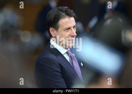 Brussels. 18th Oct, 2018. Italian Prime Minister Giuseppe Conte arrives for the second day of EU summit on Oct. 18, 2018, in Brussels, capital of Belgium. Credit: Ye Pingfan/Xinhua/Alamy Live News Stock Photo