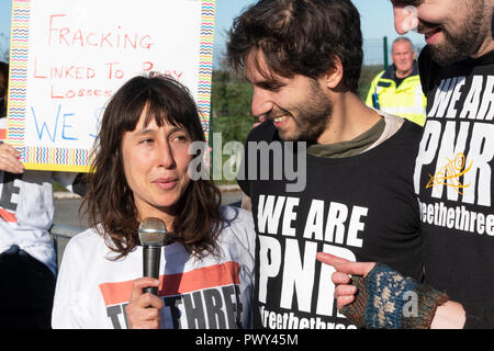 Blackpool. UK, 18th Oct. 2018. Three anti-fracking campaigners who were released from Preston jail after their successful appeal against their prison sentences visited the controversial Cuadrilla exploratory shale gas site and issued their press release to the gathered media. Supported by their partners they addressed the  crowd to explain why they will continue to campaign against fracking, their time in jail and the overwhelming support from fellow campaigners. Their partners also gave their thanks to fellow campaigners.  Credit: Dave Ellison/Alamy Live News Stock Photo