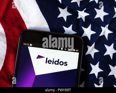 Kiev, Ukraine. 18th Oct, 2018. Leidos Scientific research company logo seen displayed on smart phone. Leidos, formerly known as Science Applications International Corporation, is an American defense, aviation, information technology, and biomedical research company, that provides scientific, engineering, systems integration, and technical services. Credit: Igor Golovniov/SOPA Images/ZUMA Wire/Alamy Live News Stock Photo