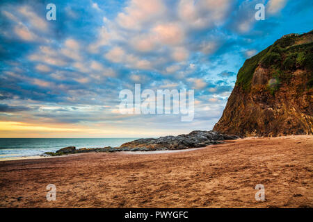 Sunset over the beach at Tresaith in Ceredigion, Wales. Stock Photo