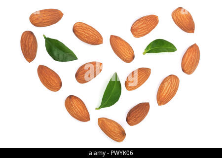 almonds in the shape of a heart with leaves isolated on white background. Top view. Flat lay pattern. Stock Photo