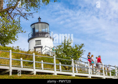 The Owls Head Light is an active aid to navigation located at the entrance of Rockland Harbor on western Penobscot Bay in the town of Owls Head, Knox  Stock Photo