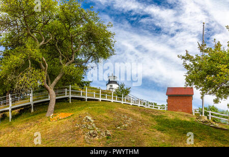The Owls Head Light is an active aid to navigation located at the entrance of Rockland Harbor on western Penobscot Bay in the town of Owls Head, Knox  Stock Photo
