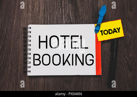 Writing note showing Hotel Booking. Business photo showcasing Online Reservations Presidential Suite De Luxe Hospitality Open notebook white page clot Stock Photo