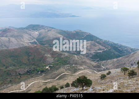 Narrow mountain road up to Pantokrator, the highest point on the Greek island of Corfu Stock Photo