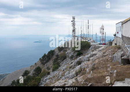 Telecommunications masts and aerials at Pantokrator, the highest point on the Greek island of Corfu Stock Photo