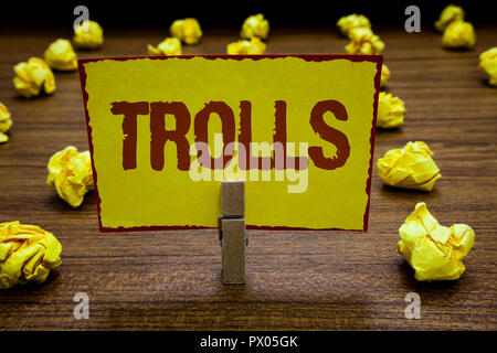 Handwriting text writing Trolls. Concept meaning Internet slang troll  person who starts upsets people on Internet Stock Photo - Alamy