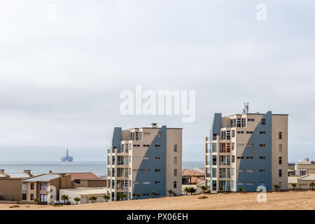 Modern houses of Dolfynstrand resort at the seaside, close to Walvis Bay, Namibia Stock Photo
