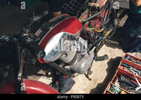 Motorbike in repair garage Stock Photo
