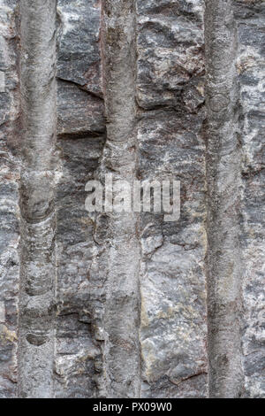 Gray surface of marble stone with striped streaks. Stock Photo