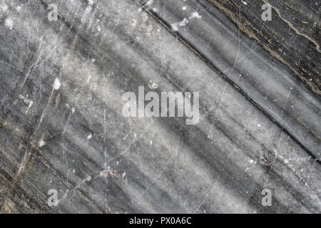 Gray surface of marble stone with striped streaks. Stock Photo