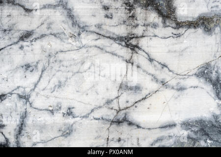 Gray surface of marble stone with striped streaks. Stock Photo