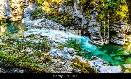 The turquoise waters of the Coquihalla River as it flows through the Coquihalla Canyon and the Othello Tunnels of the old Kettle Valley Railway in BC Stock Photo