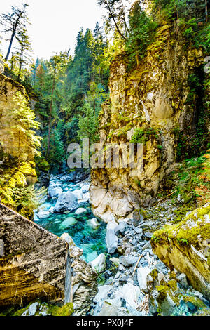 The turquoise waters of the Coquihalla River as it flows through the Coquihalla Canyon and the Othello Tunnels of the old Kettle Valley Railway in BC Stock Photo