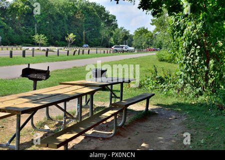 Durand Eastman Beach park picnic table, BBQ on Lake Ontario, one of the Great Lakes, near Rochester, New York, USA Stock Photo