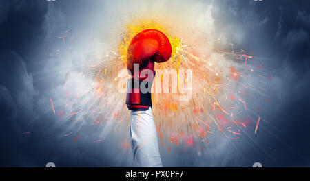 Hand hits strongly and makes fire beam around  Stock Photo