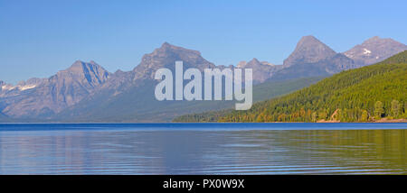 Colorful Mountains Above and Lake McDonald in Glacier National Park in Montana Stock Photo